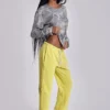 Pantalon de jogging Cleo ample à coupe bootcut, couleur fluo
