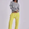 Pantalon de jogging Cleo ample à coupe bootcut, couleur fluo