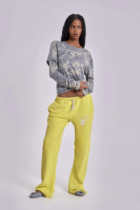 Pantalon de jogging Cleo ample à coupe bootcut, couleur fluo
