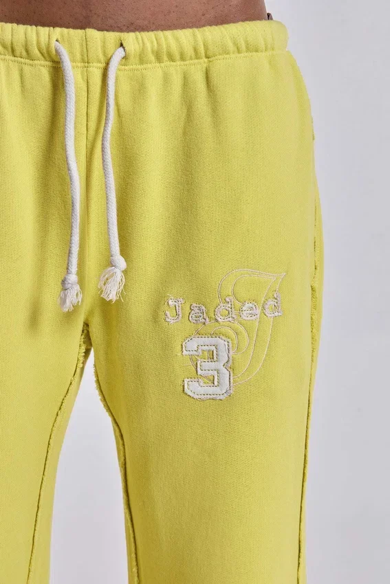 Pantalon de jogging Cleo ample à coupe bootcut, couleur fluo