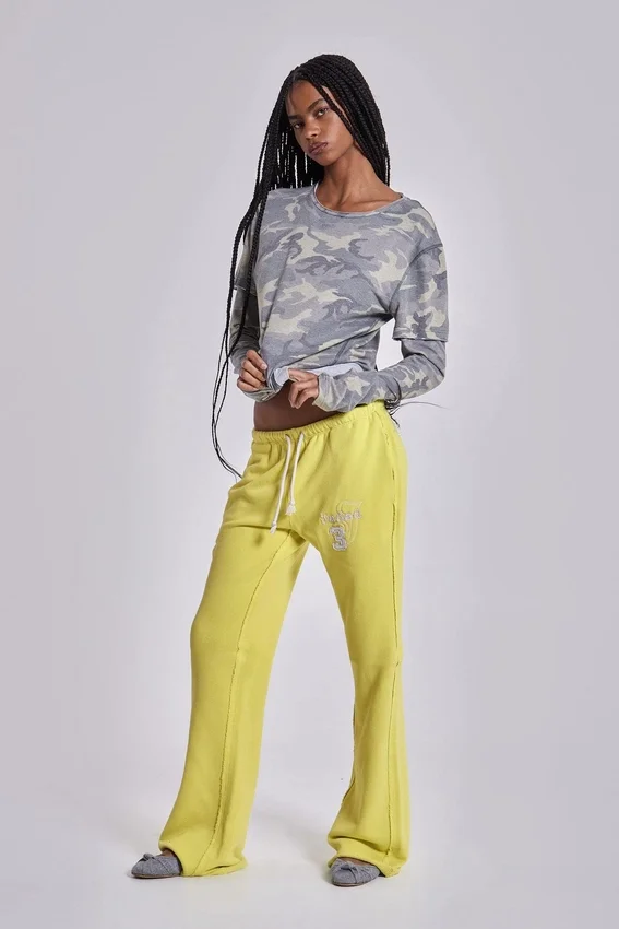 Pantalon de jogging Cleo ample à coupe bootcut, couleur fluo