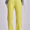 Pantalon de jogging Cleo ample à coupe bootcut, couleur fluo