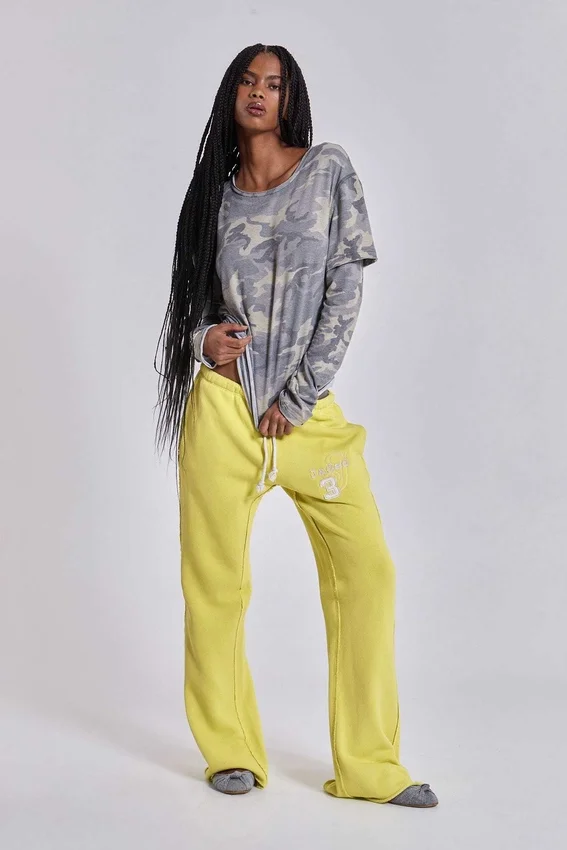 Pantalon de jogging Cleo ample à coupe bootcut, couleur fluo