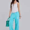 Pantalon de jogging Cleo ample à coupe bootcut, couleur turquoise