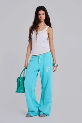 Pantalon de jogging Cleo ample à coupe bootcut, couleur turquoise