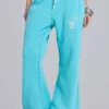 Pantalon de jogging Cleo ample à coupe bootcut, couleur turquoise