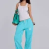 Pantalon de jogging Cleo ample à coupe bootcut, couleur turquoise