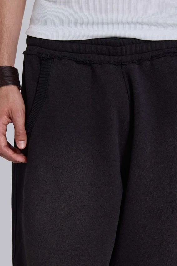Pantalon de jogging Monster baggy noir à revers