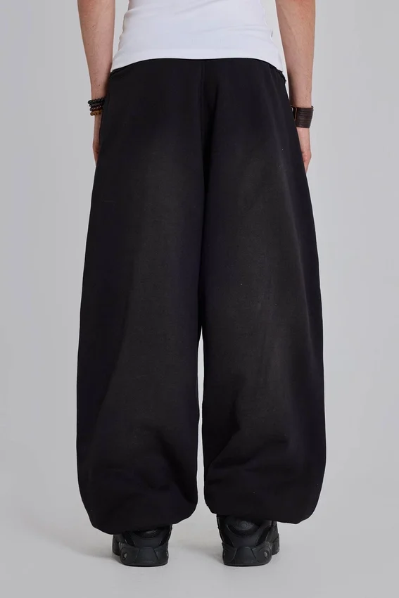 Pantalon de jogging Monster baggy noir à revers