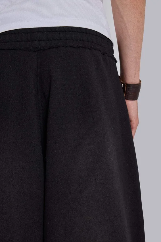 Pantalon de jogging Monster baggy noir à revers