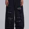 Pantalon de jogging « Monster Joggers » à carreaux superposés