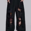 Pantalon de jogging Monster noir baggy délavé