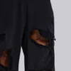Pantalon de jogging Monster noir baggy délavé