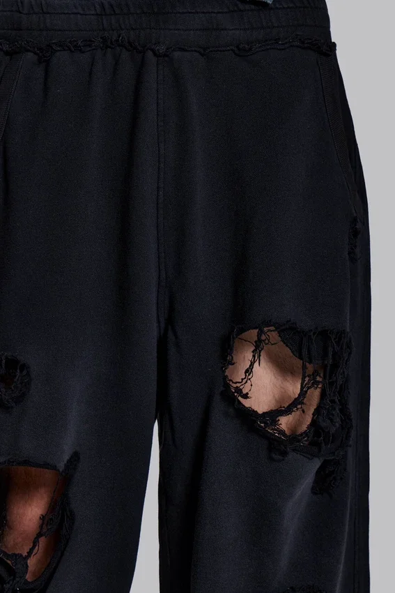 Pantalon de jogging Monster noir baggy délavé