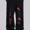 Pantalon de jogging Monster noir baggy délavé