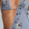 Robe longue asymétrique Brisa ornée de perles cousues à la main
