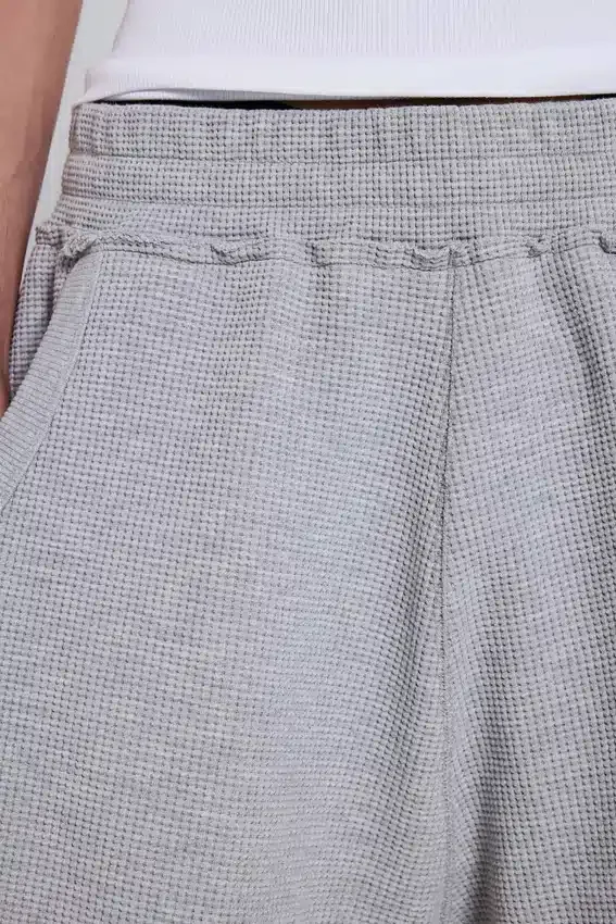 Short de jogging « Monster » en tissu gaufré gris chiné