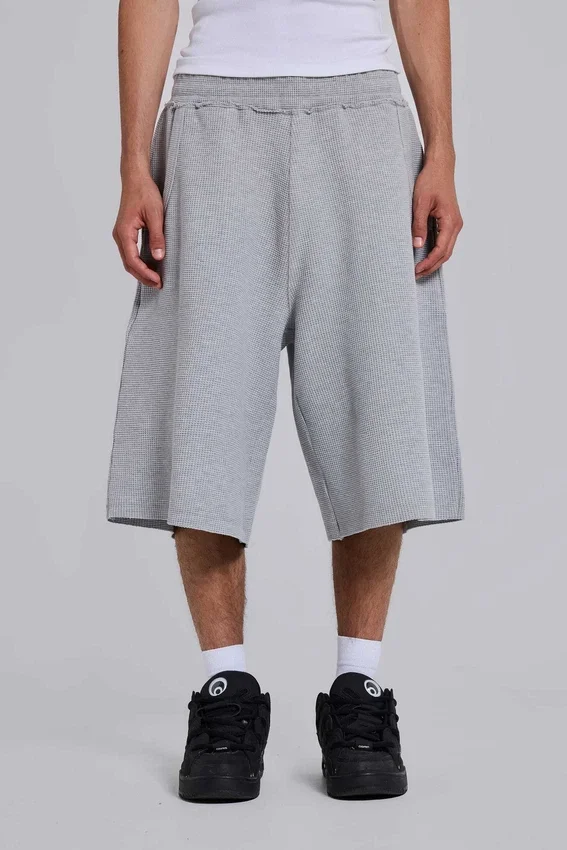 Short de jogging « Monster » en tissu gaufré gris chiné