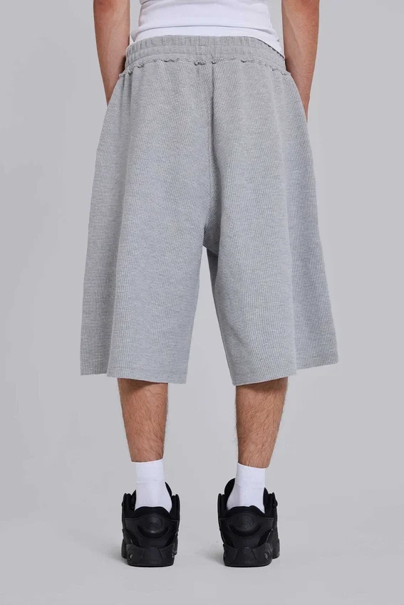 Short de jogging « Monster » en tissu gaufré gris chiné