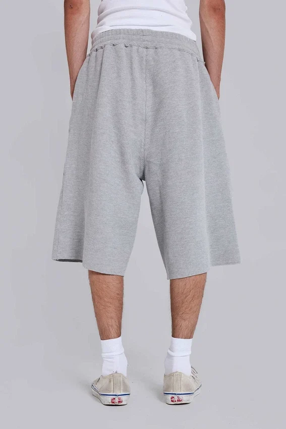 Short de jogging « Monster » en tissu gaufré gris chiné