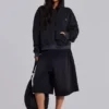 Sweat à capuche zippé noir délavé « Sun Faded » avec doublure en tissu gaufré