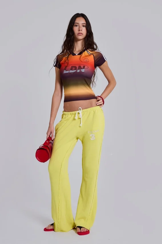 Pantalon de jogging Cleo ample à coupe bootcut, couleur fluo